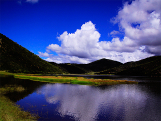 到云南梅里雪山旅游報(bào)團(tuán)價(jià)格_云南梅里雪山游跟團(tuán)多少錢2021_去云南梅里雪山游要多少錢