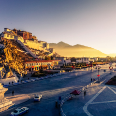 Potala Palace and stupa at dusk in Lhasa, Tibet