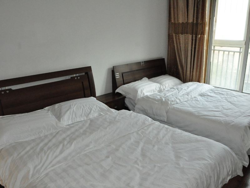 大连舒雅精致两室三室观景家庭套房公寓(黄海西四街分店)