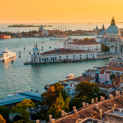 View of Basilica di Santa Maria della Salute (Saint Mary of Health) from Campanile di San Marco (St. Mark's Campanile) at the sunset, Venice, Italy