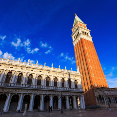  Piazza San Marco with the Basilica of Saint Mark and the bell tower of St Mark's Campanile (Campanile di San Marco) in Venice, Italy, noon light with blue sky image