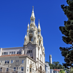 The Coit Tower and Saints Peter and Paul Church photographed from Washington Square  in the North Beach area of San Francisco, California, USA.