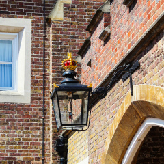 Outside, exterior view of a lantern at St James Palace facede, London UK