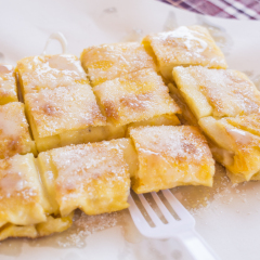 Dessert style of fried Roti with banana cooking on the street in Bangkok, Thailand
