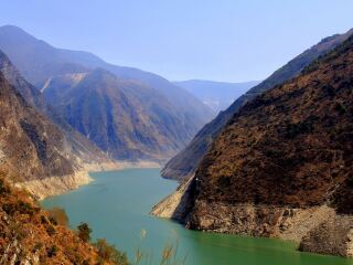 去四川稻城亞丁旅游要多少錢_四川稻城亞丁游跟團多少錢2021_四川稻城亞丁跟團游與自由行