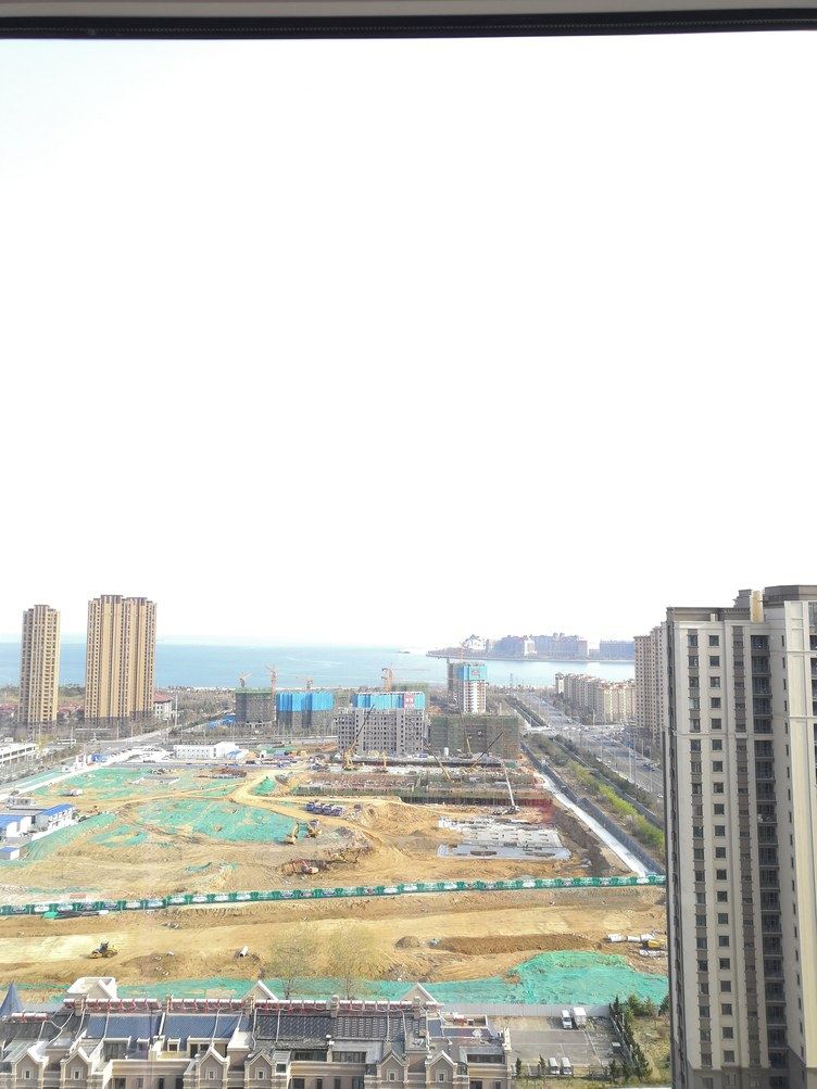 青岛万达东方影都黄海学院鑫都汇府两居海景民宿