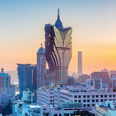 Macau, city skyline at sunset.