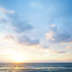 blue sky with clouds and sea, sunset