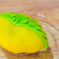 Ice cream durian which made like durian, king of fruit. Thai dessert.Durian ice-cream on a plate, ready to eat.