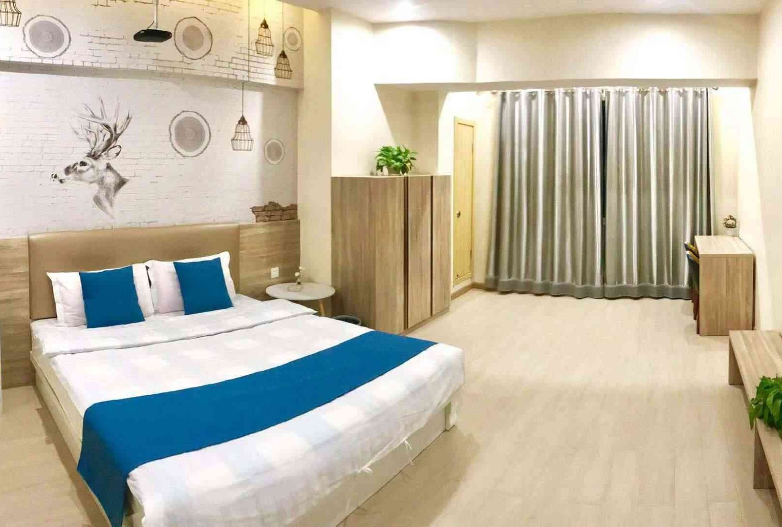 唐山暖馨观影主题公寓