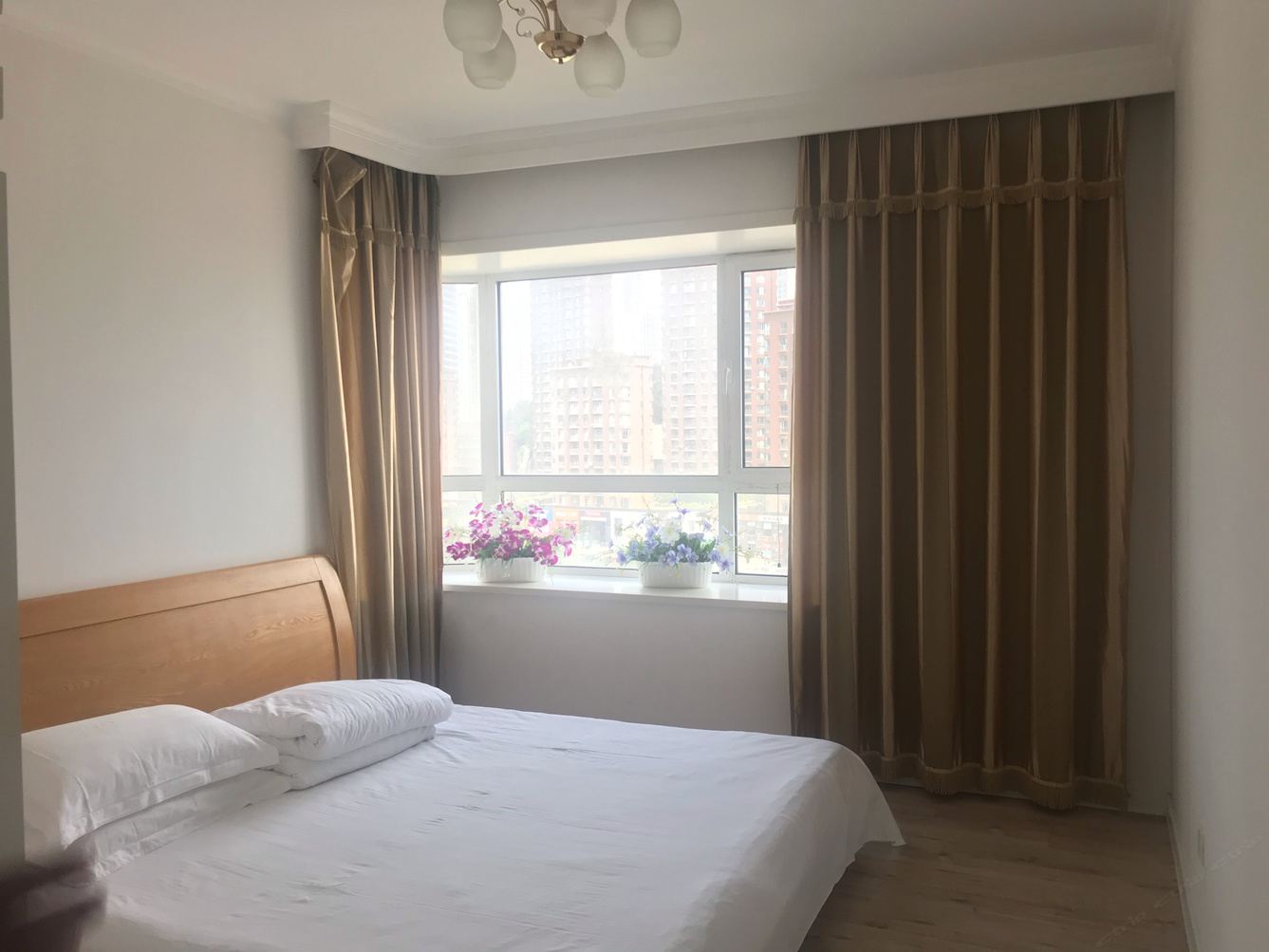 大连星海广场爱美丽家庭公寓(13号店)