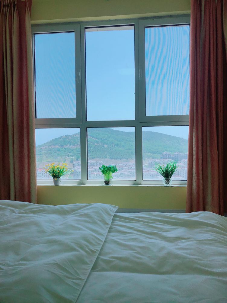 青岛爱屋及乌公寓