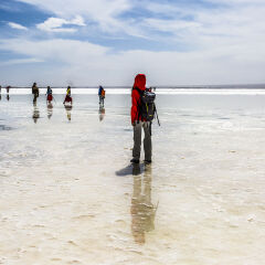 Girl stand on salt lake