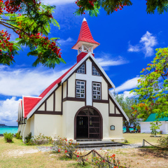 landmarks of  Mauritius island - beautiful Red church on the beach
