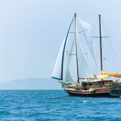 Small group of people on sailing ship
