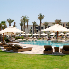 Swimming pools and beach at the luxury hotel, Saadiyat island, Abu Dhabi, UAE