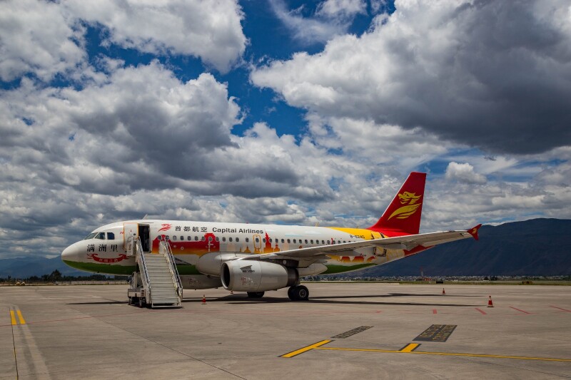 带着挖财去旅行#在丽江,邂逅蓝天白云下流淌着的故事【首发】