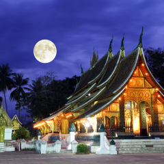 Colorful Wat Xieng thong temple at dusk in Luang Prabang, Loas