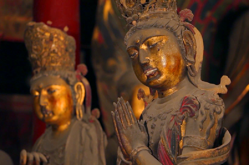 华严寺最为经典的一尊塑像合掌露齿菩萨