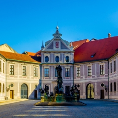 Munich, Germany - octagonal yard called Fountain Courtyard (Brunnenhof ) is one of the ten courtyards of the Residenz Palace. The bronze Wittelsbach Fountain in the middle was erected in 1610.
