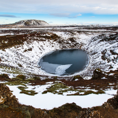 Kerio, volcanic crator,  in winter under blue sky, Iceland