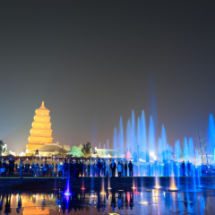 big wild goose pagoda in Xi'an at night with fountains,China.
