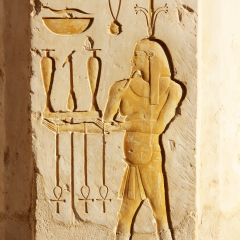 Ancient Pictures Carved in Sandstone Wall in Egypt