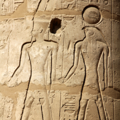 Ancient Pictures Carved in Sandstone Wall in Egypt
