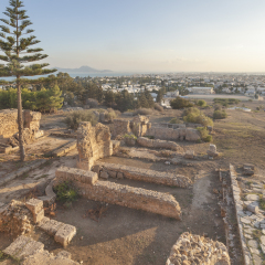 Ruins on the hilltop Byrsa with city Tunis in background, Carthage, Tunisia