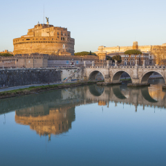 Castle of Holy Angel (Castel Sant Angelo)  and Holy Angel Bridge over the Tiber River in Rome at sunset. Italy, Europe 