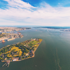 Aerial view of the Governors Island with Brooklyn New York in the background