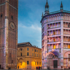 View of Battistero building illuminated in the night, Parma, Italy.