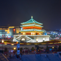 Bell Tower of Xi'an traditional building, that marks the geographical center of the ancient capital Ming Dynasty at night under fog, China