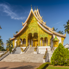 Horizontal view of The Palace chapel or Haw Pha Bang in Luang Prabang on a sunny day, Laos.