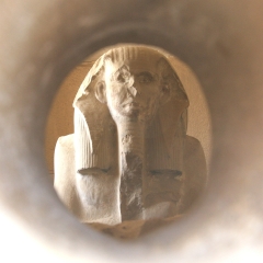 Statue of Djoser viewed through an offering Hole, Saqqara, Egypt