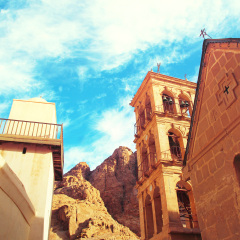 Church and monastery in Saint Catherine next to Moses' mountain (Egypt, Sinai). Famous place for Christianity Orthodoxy pilgrims. Tinted toned coloration image