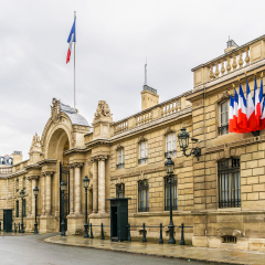 View of entrance gate of the Elysee Palace from the Rue du Faubourg Saint-Honore. Elysee Palace - official residence of President of French Republic since 1848.