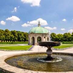 Beautiful Diana temple (Dianatempel) and a fountain in central Munich's Hofgarten (Court Garden), a renaissance garden located between the Residenz and the Englischer Garten. Munich, Bavaria, Germany.