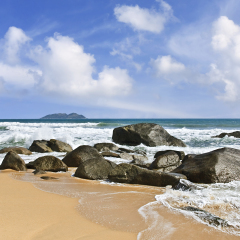 Rock formation in the surf in Sanya, Hainan Island, China