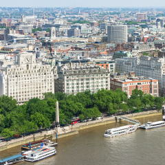 London panorama with Victoria Embankment on river Thames with Cleopatra's Needle and urban architectures. United Kingdom