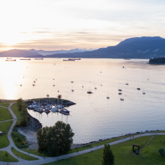 Beautiful Sunset viewed from an aerial perspective of Burrard Inlet from Kits Point, Vancouver, BC, Canada.