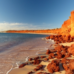 red coastal cliffs in the evening sun in Francois Peron National Park , Western Australia