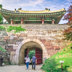 Romantic couple in the Namhansanseong Provincial Park in summer. Namhansanseong Fortress. Gwangju,South Korea.