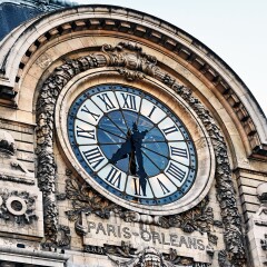 view of wall clock in D'Orsay Museum. D'Orsay - a museum on left bank of Seine, it is housed in former Gare d'Orsay