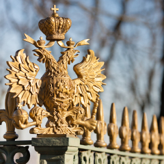 State Russian double-headed eagle on the fence of the Cabin of Peter the Great in St. Petersburg, Russia