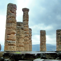 Columns in the ruins of Delphi near Phocis, Greece, under stormy skies