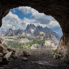 Panorama from man-made caves, Dolomites, Italy. In the peaks of Tre Cime di Lavaredo (Dolomites, Italy) there are a number of fortifications, man-made caves, and commemorative plaques (World War I).
