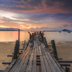 Old Jetty at Black Sand Beach in Langkawi Island, Malaysia.
