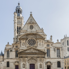 Church of Saint-Etienne-du-Mont (1494-1624) in Paris near Pantheon. It contains shrine of St. Genevieve - patron saint of Paris. Church also contains tombs of Blaise Pascal & Jean Racine. Clock tower.