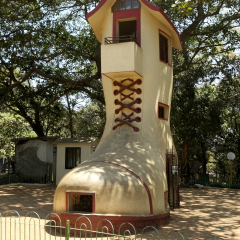 The giant concrete Shoe House for children in Hanging Gardens and the adjoining Kamala Nehru Park in Malabar Hill district of city Mumbai, India, Asia.